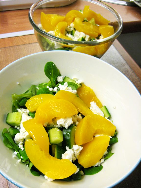 Peach, cucumber and honey goat cheese salad