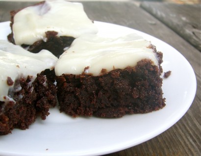triple chocolate brownies with white chocolate cream cheese frosting