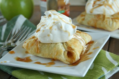 Apple puffs with fresh cream and warm caramel sauce