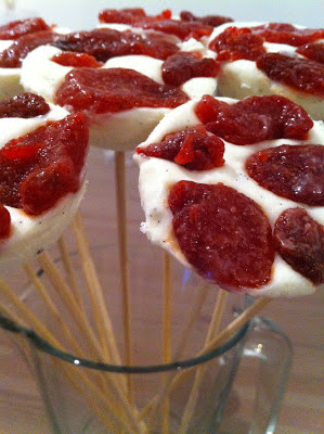 cheesecake flowers topped with candied strawberries
