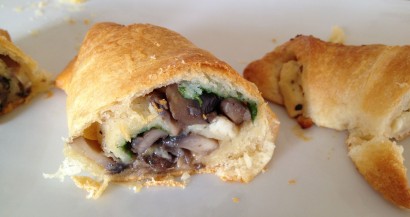 Pillsbury crescent rolls filled with feta, arugula and sauteed mushrooms