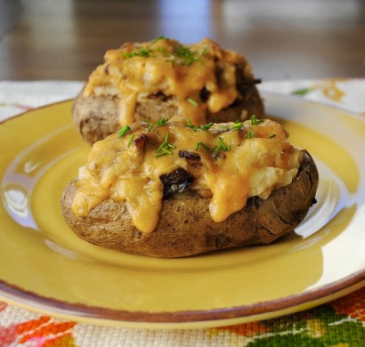 Twice baked potatoes with caramelized onions and cheddar