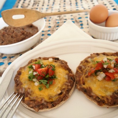 molletes (toasted bread with refried beans and cheese)