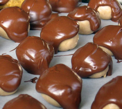 peanut butter balls with chocolate-butterscotch covering