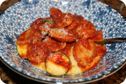 sausage and zucchini over parmesan polenta