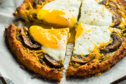 breakfast cauliflower pizza with eggs and leek bacon pesto