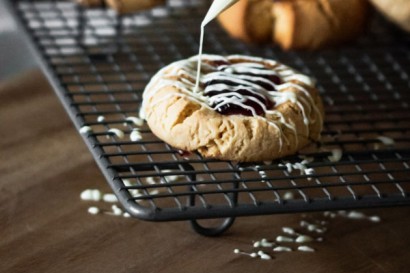 peanut butter & jam cookies with white chocolate drizzle