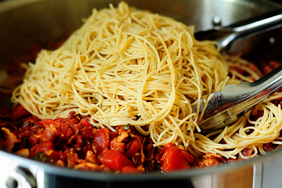 Tasty Kitchen Blog: Bacon Tomato Capellini. Guest post by Amy Johnson of She Wears Many Hats, recipe submitted by TK member PlanoSheila (sheilajfoster).