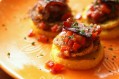 Tasty Kitchen Blog: Looks Delicious! (Fried Green Tomatoes on Polenta Rounds with Peppers, Onions, and Bacon, submitted by TK member Natalie Perry of Perry's Plate)