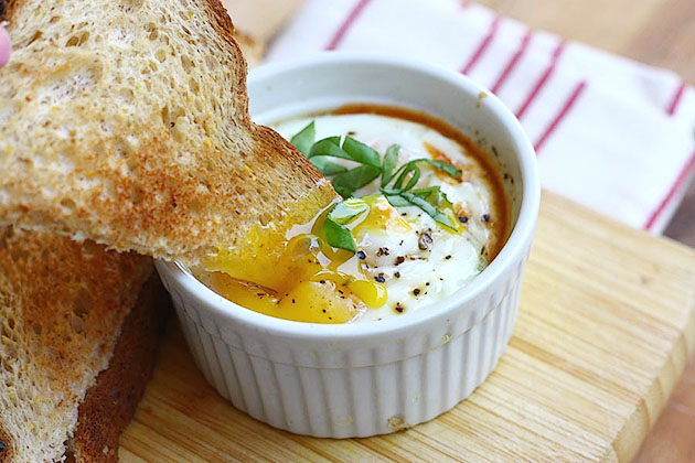 Tasty Kitchen Blog: Baked Eggs in Spicy Tomato Sauce. Guest post by Adrianna Adarme of A Cozy Kitchen, recipe submitted by TK member Erica of Apricosa.