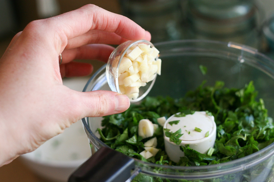 Tasty Kitchen Blog Cilantro Pecan-Pesto Layered Mediterranean Dip. Guest post by Natalie Perry of Perry's Plate, recipe submitted by TK member Beth (campgrandma) of Grandma B's Kitchen.