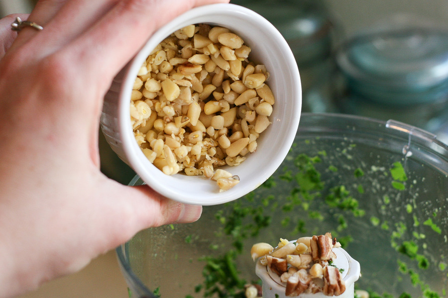 Tasty Kitchen Blog Cilantro Pecan-Pesto Layered Mediterranean Dip. Guest post by Natalie Perry of Perry's Plate, recipe submitted by TK member Beth (campgrandma) of Grandma B's Kitchen.