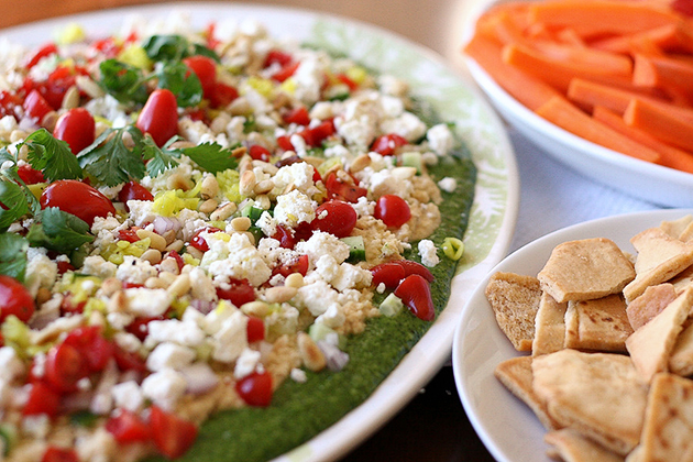 Tasty Kitchen Blog Cilantro Pecan-Pesto Layered Mediterranean Dip. Guest post by Natalie Perry of Perry's Plate, recipe submitted by TK member Beth (campgrandma) of Grandma B's Kitchen.