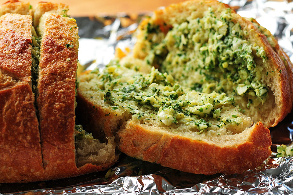 Tasty Kitchen Blog: Artichoke Feta Garlic Bread. Guest post by Amy Johnson of She Wears Many Hats, recipe submitted by TK member Traci of Lotta Madness.