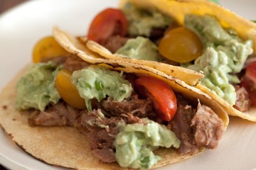 Tasty Kitchen Blog: Sweet Pulled Pork Tacos with Avocado Cream Sauce. Guest post by Gaby Dalkin of What's Gaby Cooking, recipe submmitted by TK member Tonya of 4 Little Fergusons.