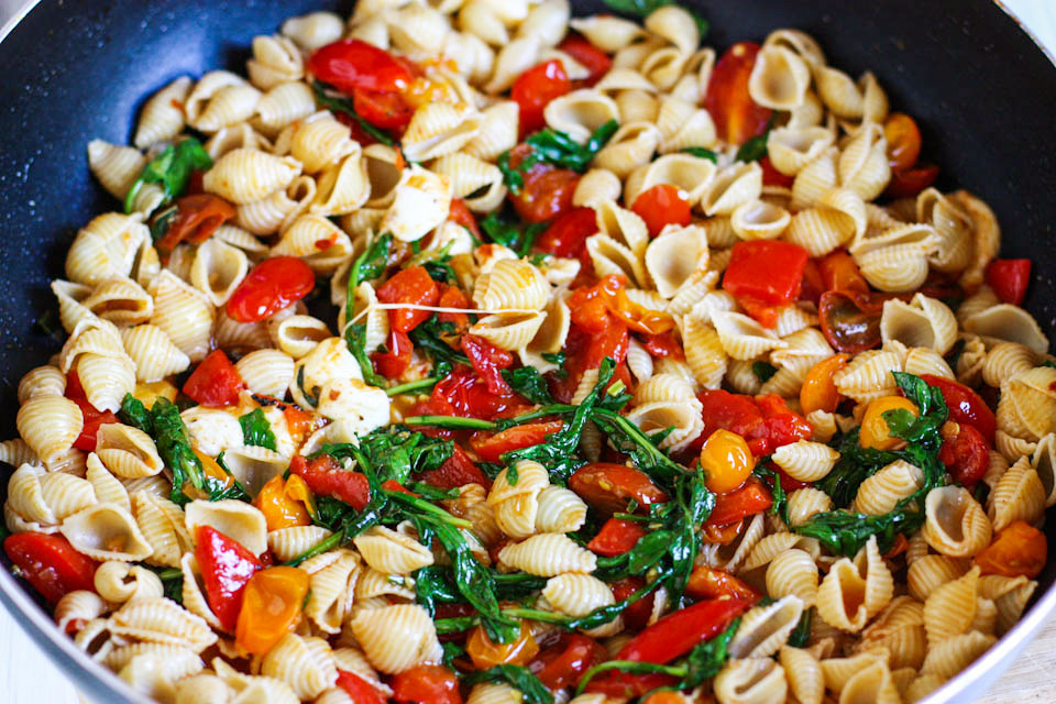 Tasty Kitchen Blog: Smoky Tomato, Roasted Red Pepper and Arugula Pasta. Guest post by Jenna Weber of Eat, Live, Run; recipe submitted by TK member Cassie of Bake Your Day.