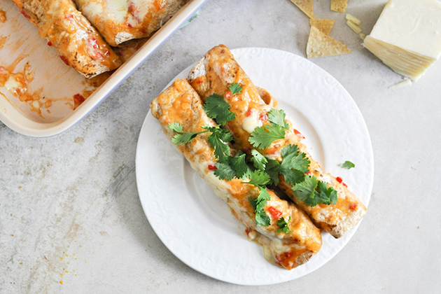 Tasty Kitchen Blog: Lightened Up Chicken Enchiladas. Guest post by Jessica Merchant of How Sweet It Is, recipe submitted by TK member Laurie McNamara of Simply Scratch.