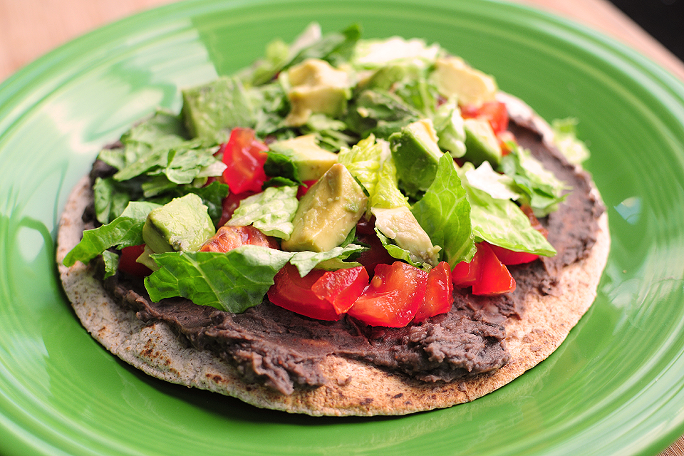 Tasty Kitchen Blog: Healthy Black Bean Tostadas with Cilantro Sauce. Guest post by Amy Johnson of She Wears Many Hats, recipe submitted by TK member Lindsay of Pinch of Yum.